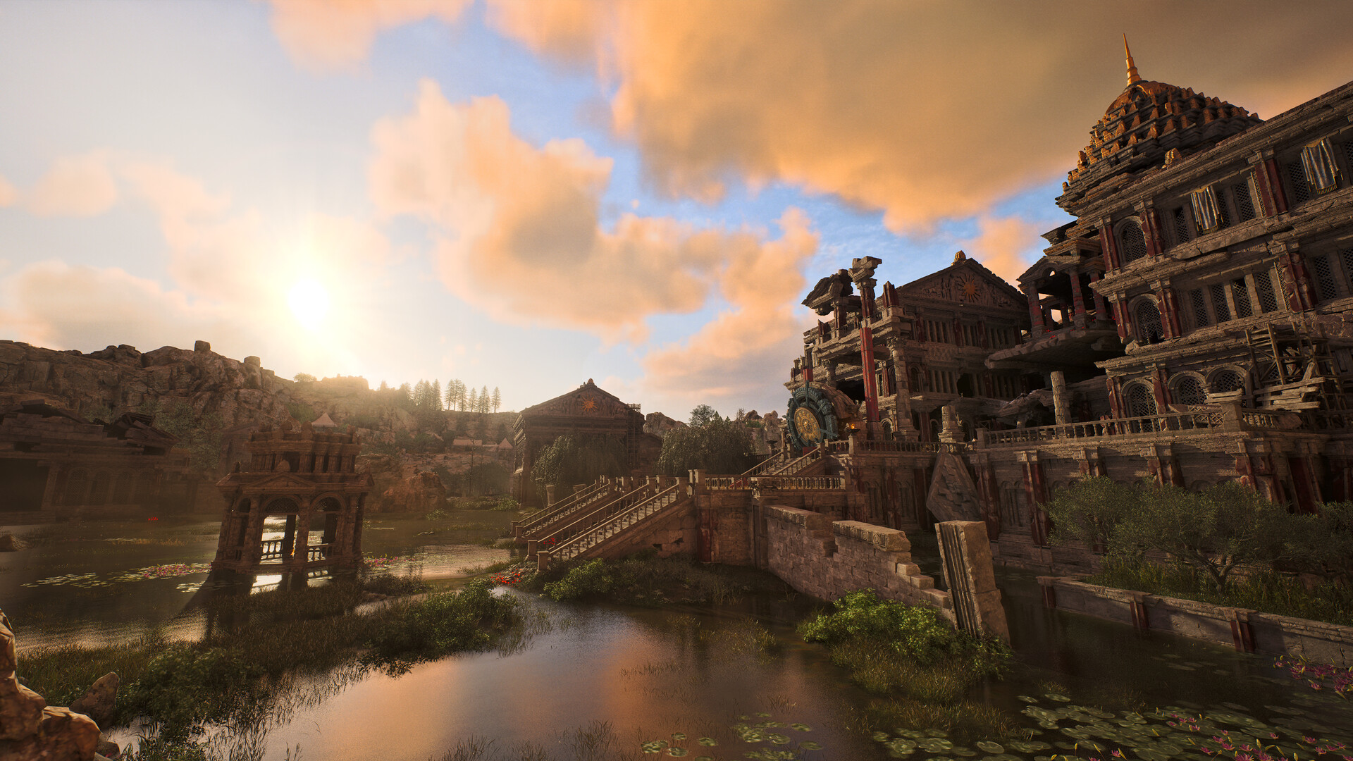A broken stone bridge crossing water in a half-ruined town at sunset
